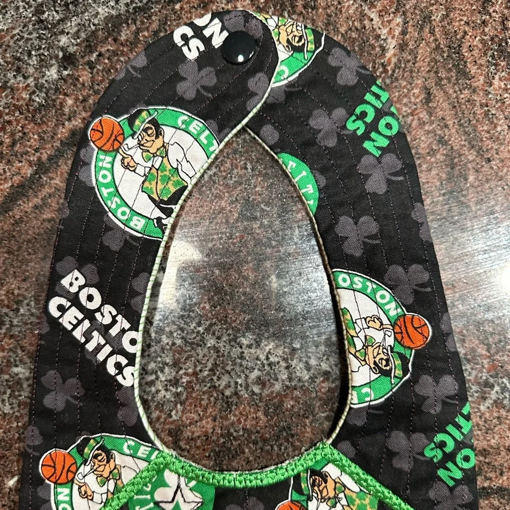 Handmade reversible quilted baby bib in Boston Celtics print